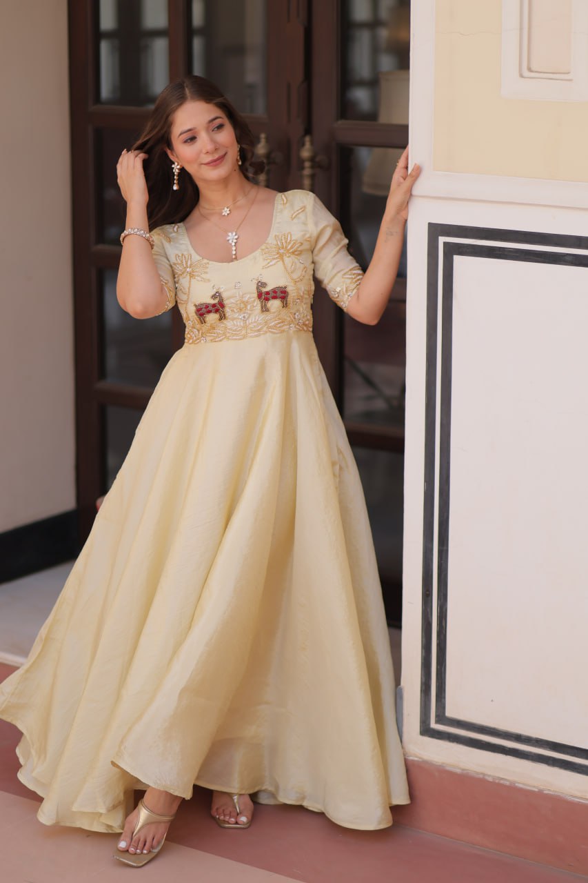Fashionable Cream Color Embroidered Gown
