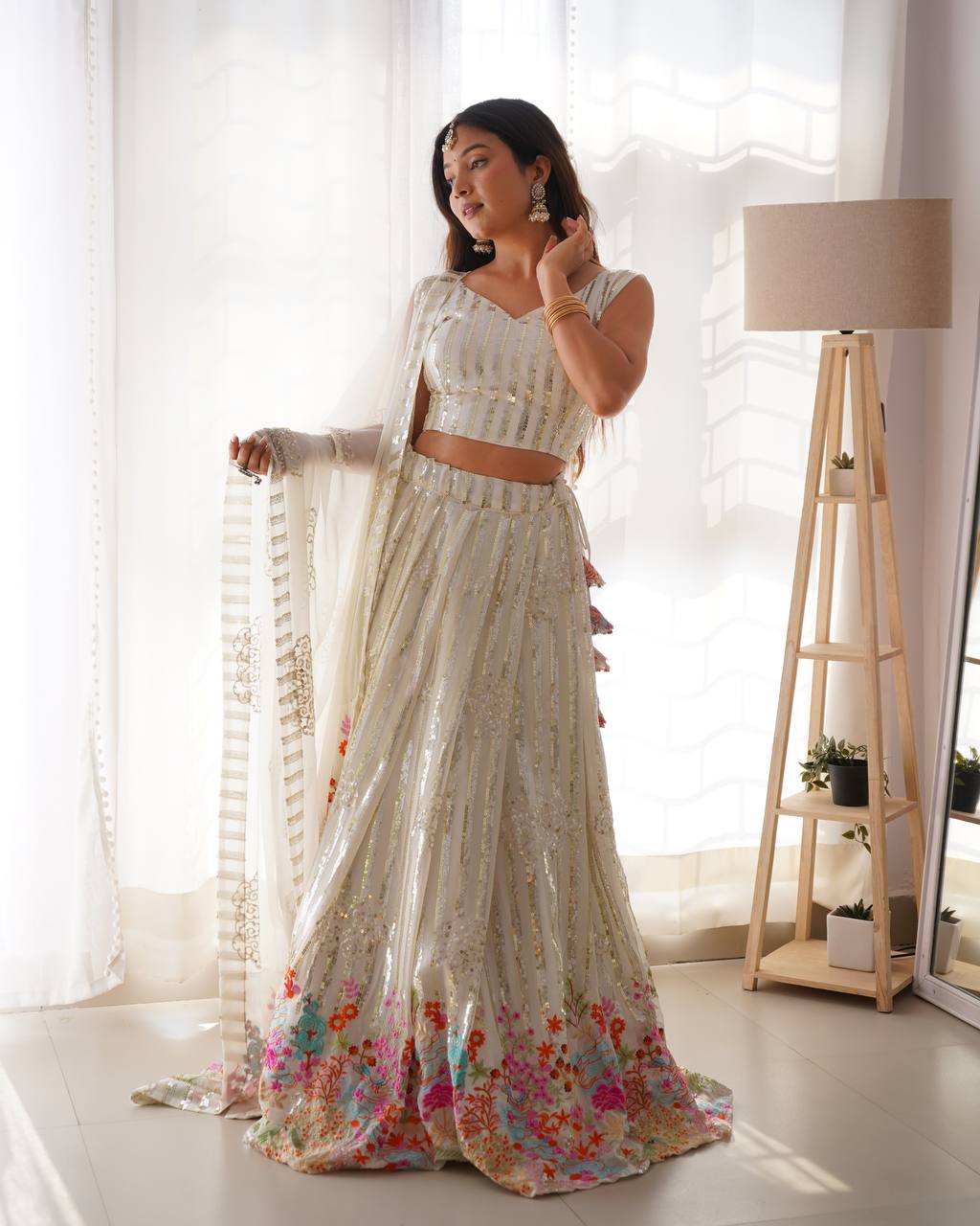 Heavy Multi Sequence Work White Color Lehenga Choli