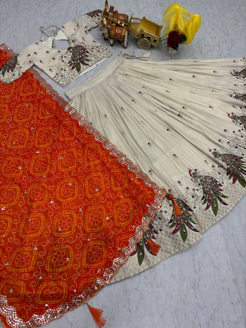 Wonderful Embroidery Work White Color Lehenga With Orange Dupatta