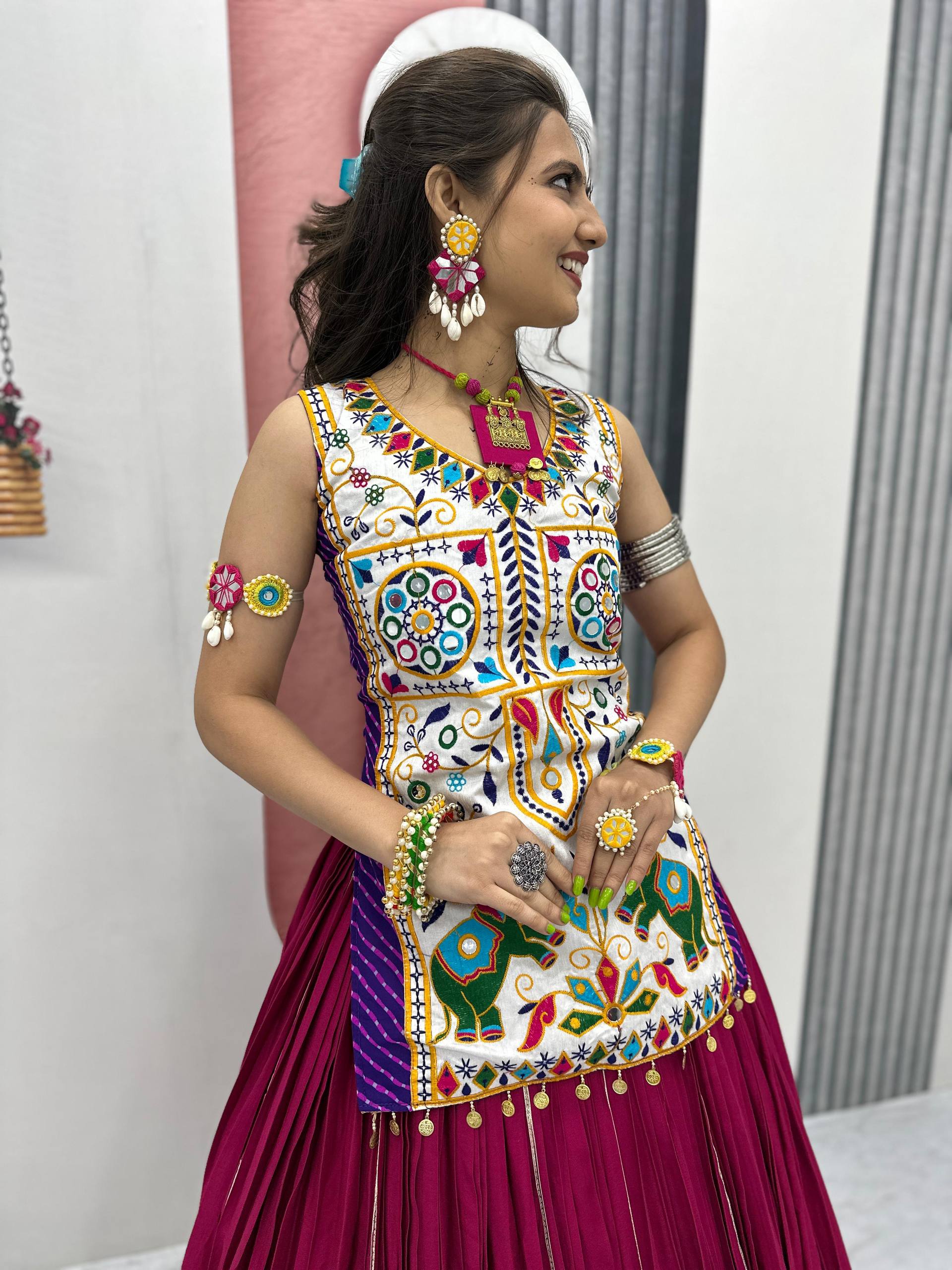 Gamthi With Mirror Work Navratri Wear Wine Color Lehenga Choli