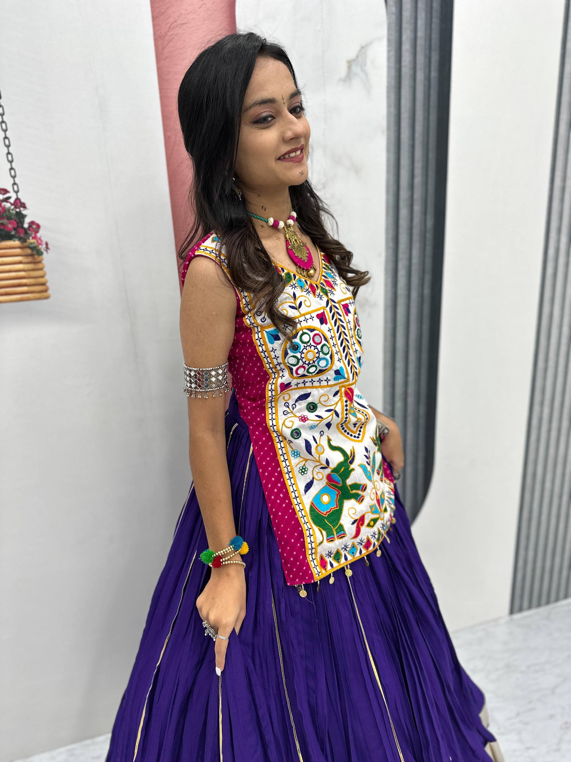 Gamthi With Mirror Work Navratri Wear Purple Color Lehenga Choli