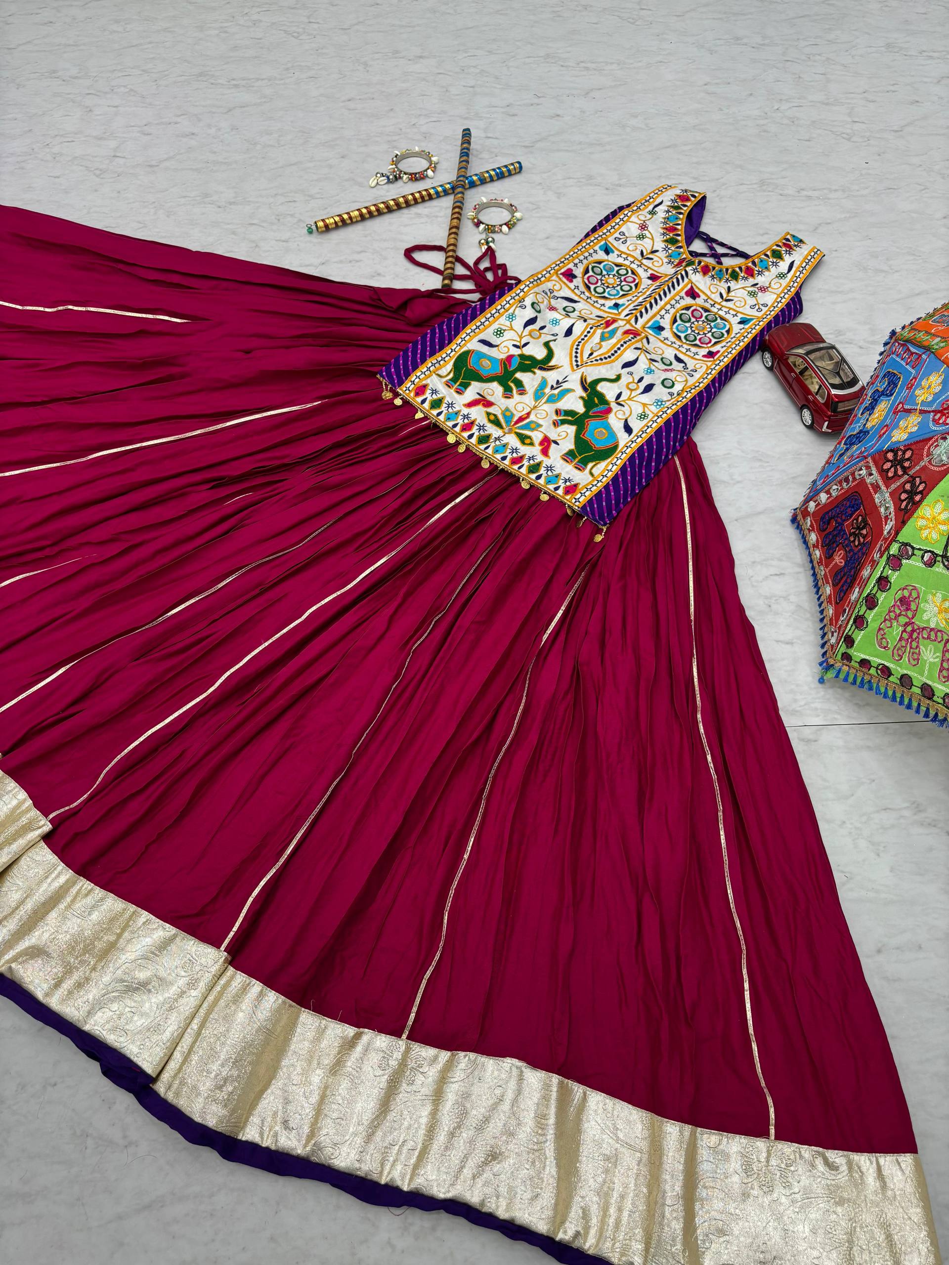Gamthi With Mirror Work Navratri Wear Wine Color Lehenga Choli
