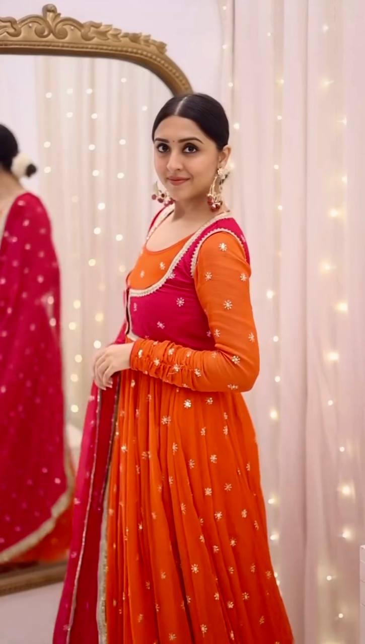 Attractive Orange Color Embroidered Gown With Koti