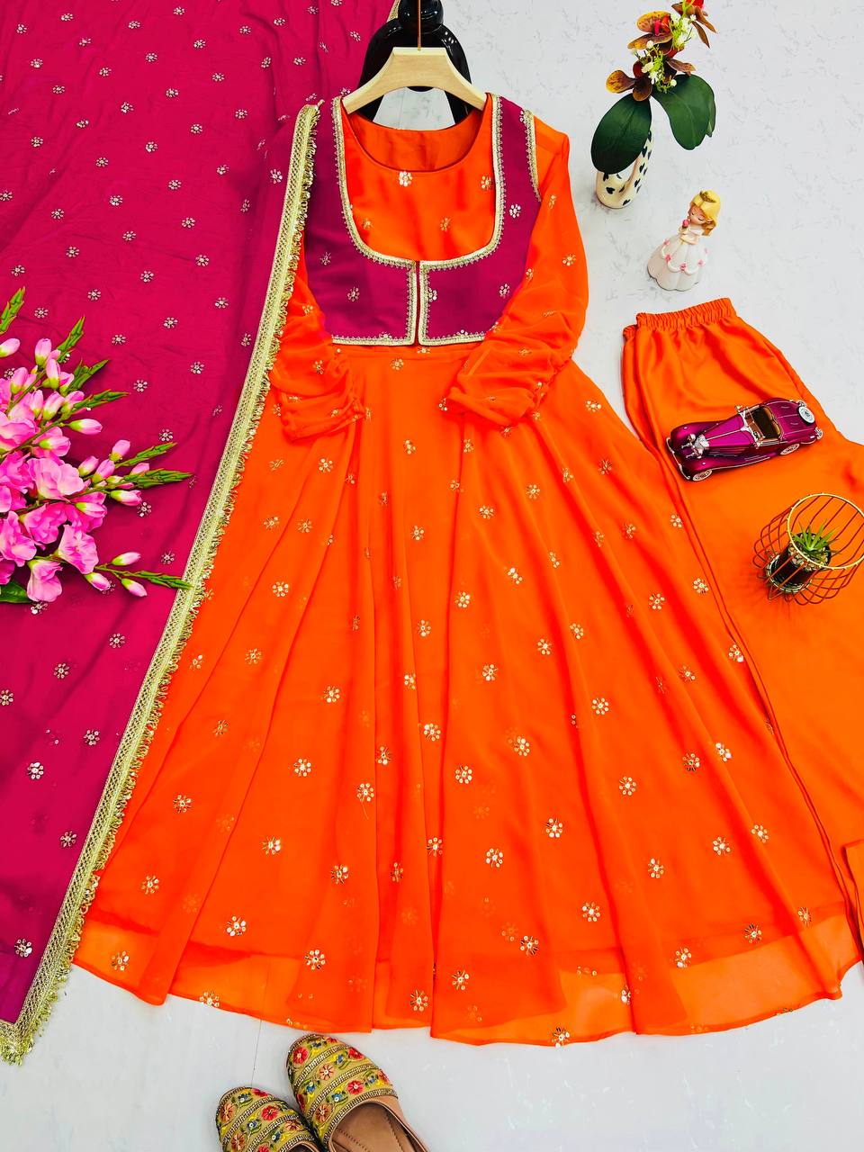 Attractive Orange Color Embroidered Gown With Koti