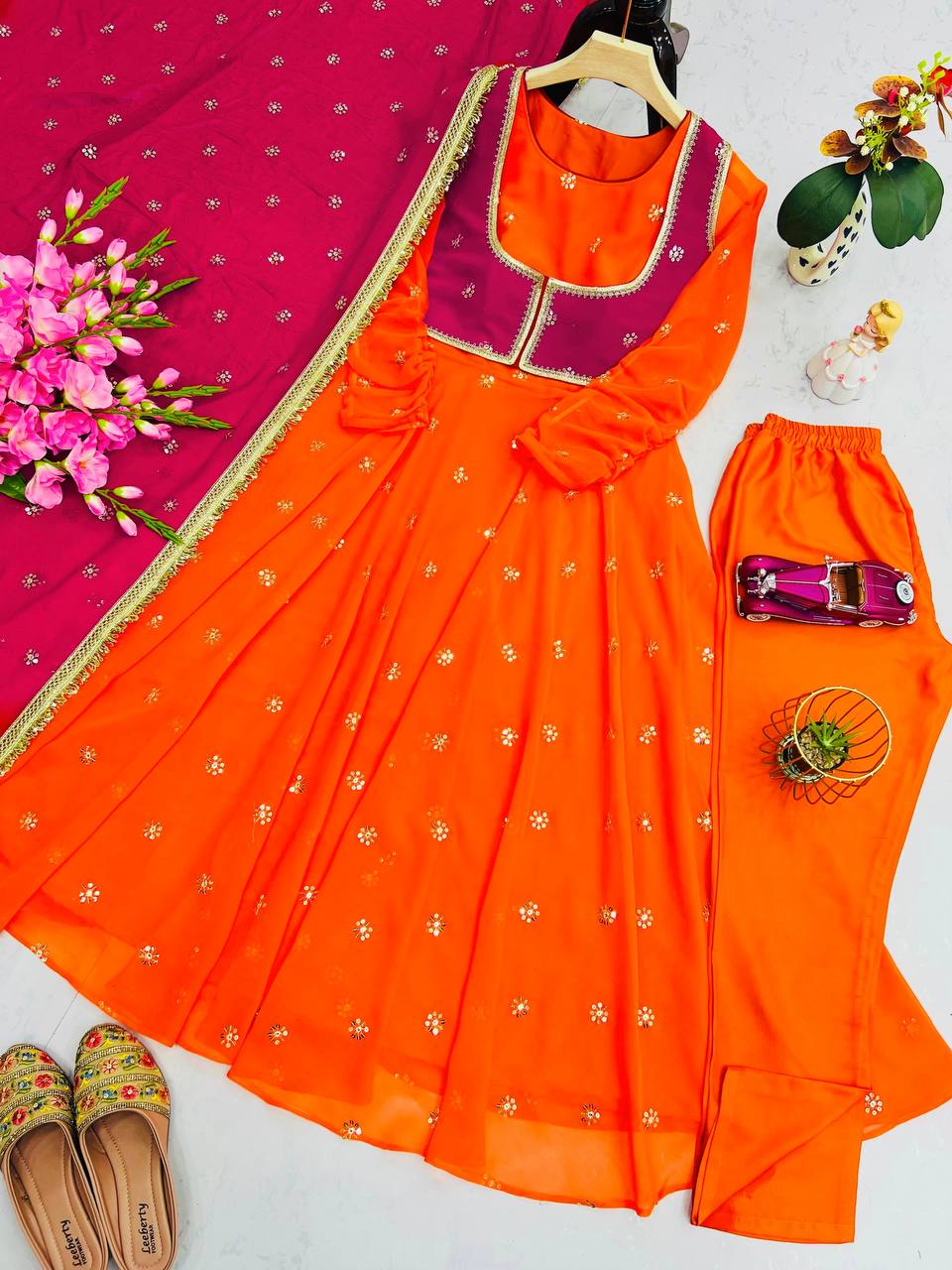 Attractive Orange Color Embroidered Gown With Koti