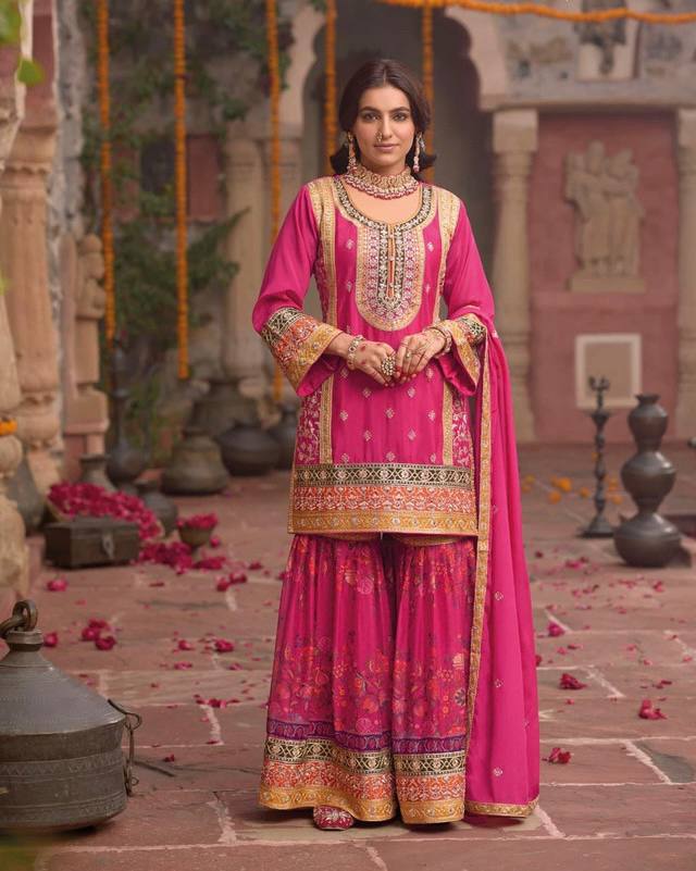 Ravishing Orange Chinon Silk with Mirror Work Sharara Suit