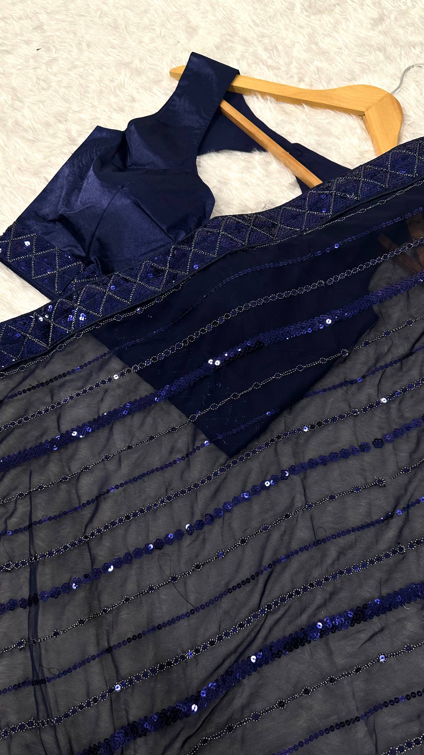 Glimmering Navy Blue Georgette Thread Work Saree