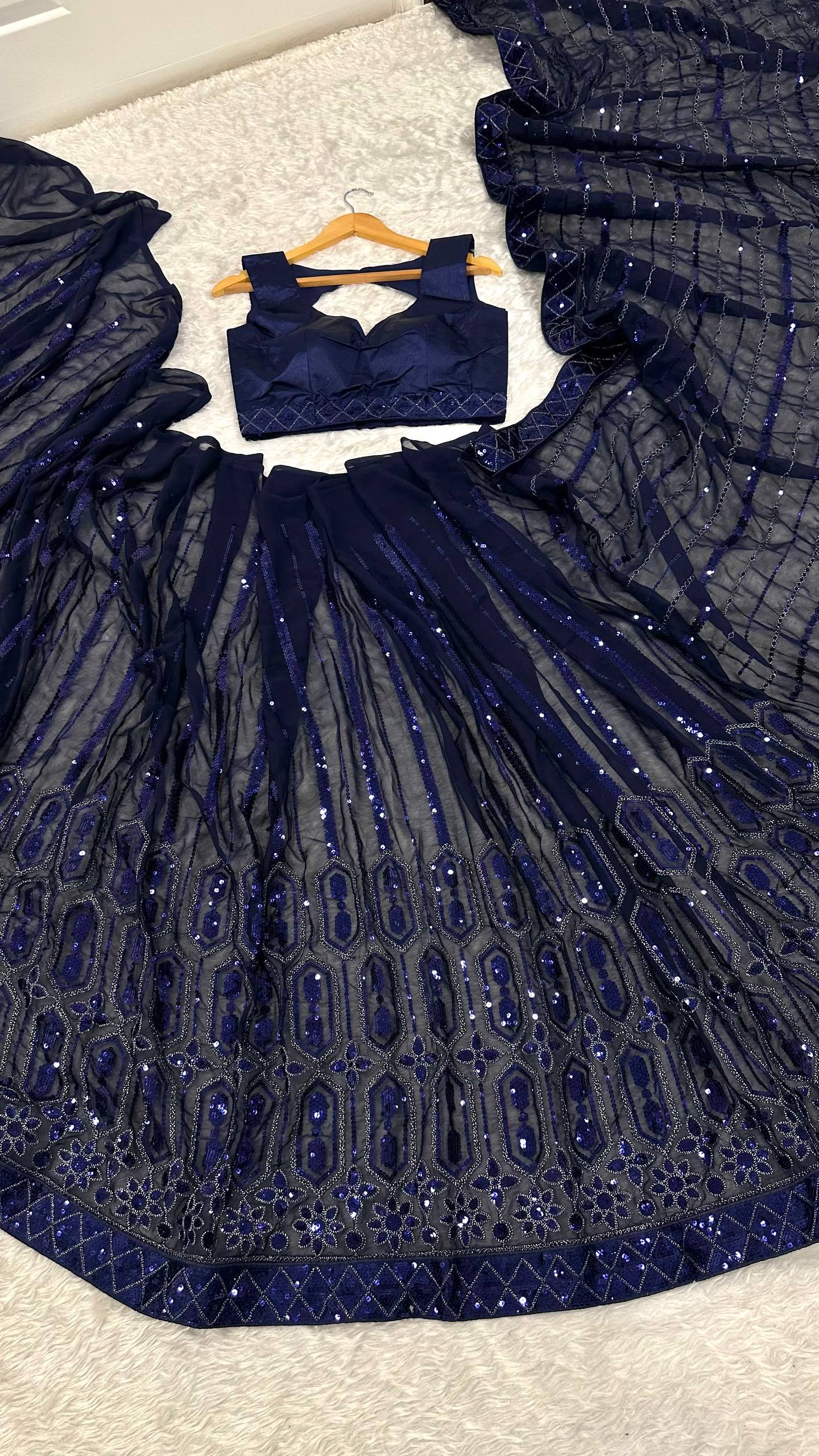 Glimmering Navy Blue Georgette Thread Work Saree