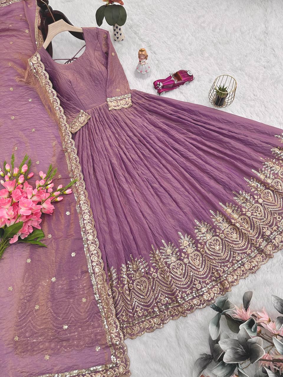 Alluring Onion Color Embroidery Work Gown