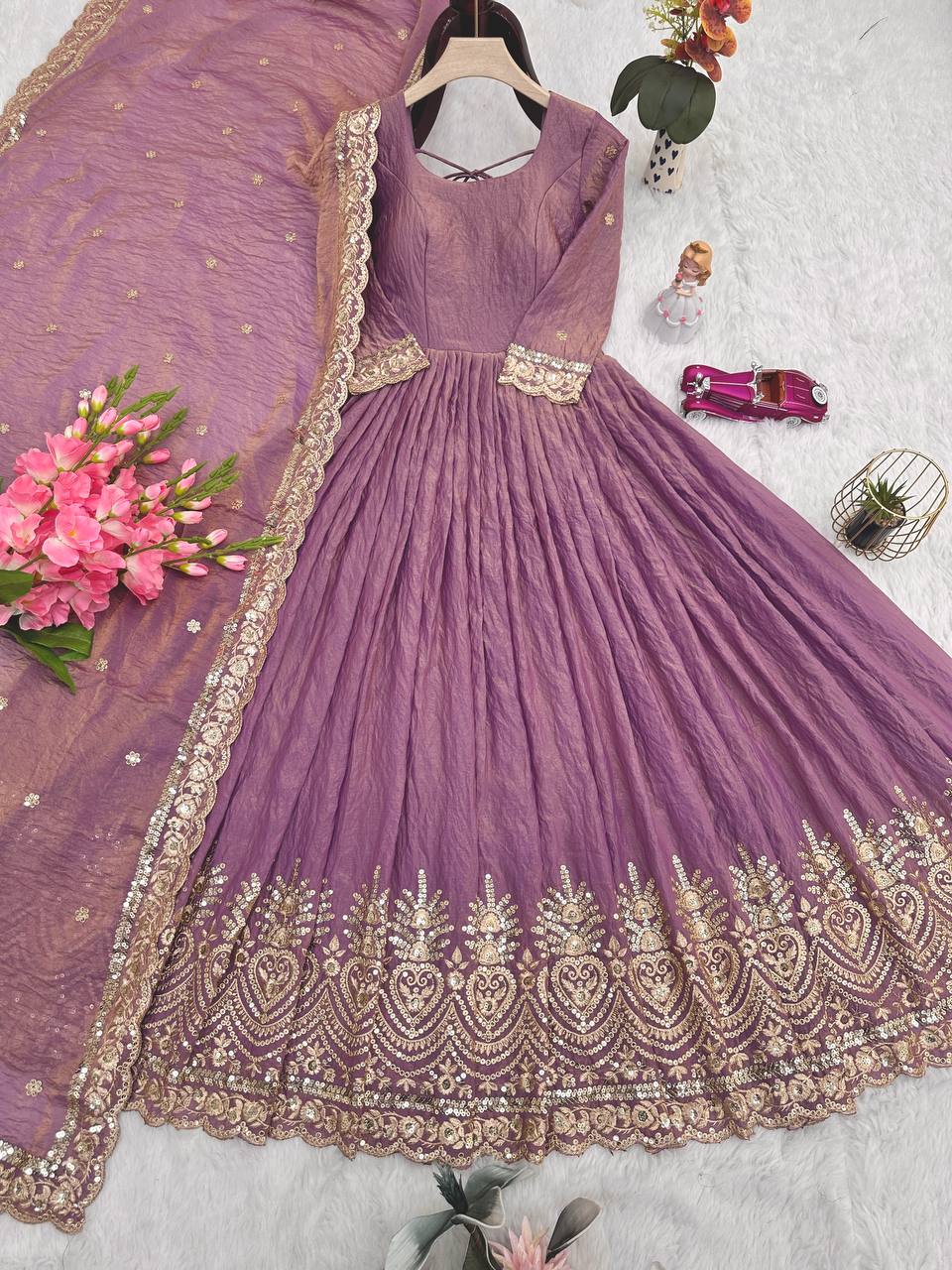 Alluring Onion Color Embroidery Work Gown
