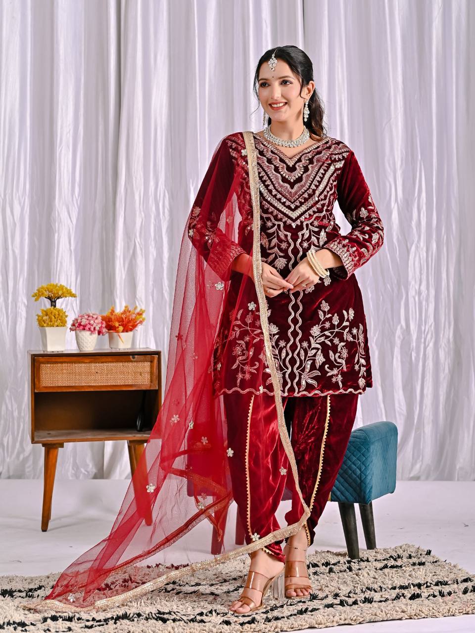Alluring Maroon Velvet Embroidery Work Dhoti Suit