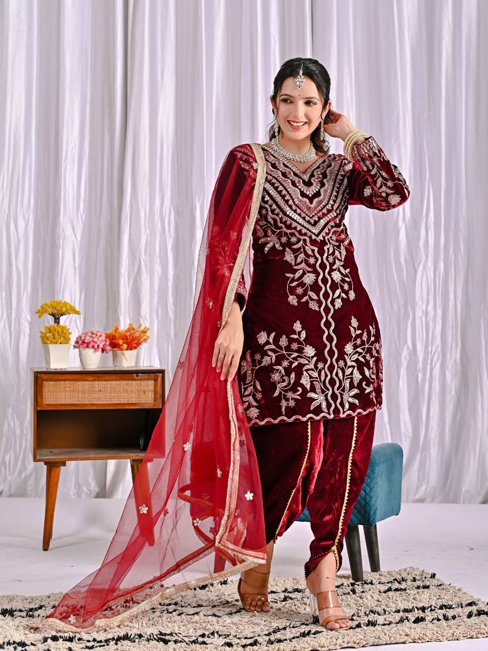 Alluring Maroon Velvet Embroidery Work Dhoti Suit