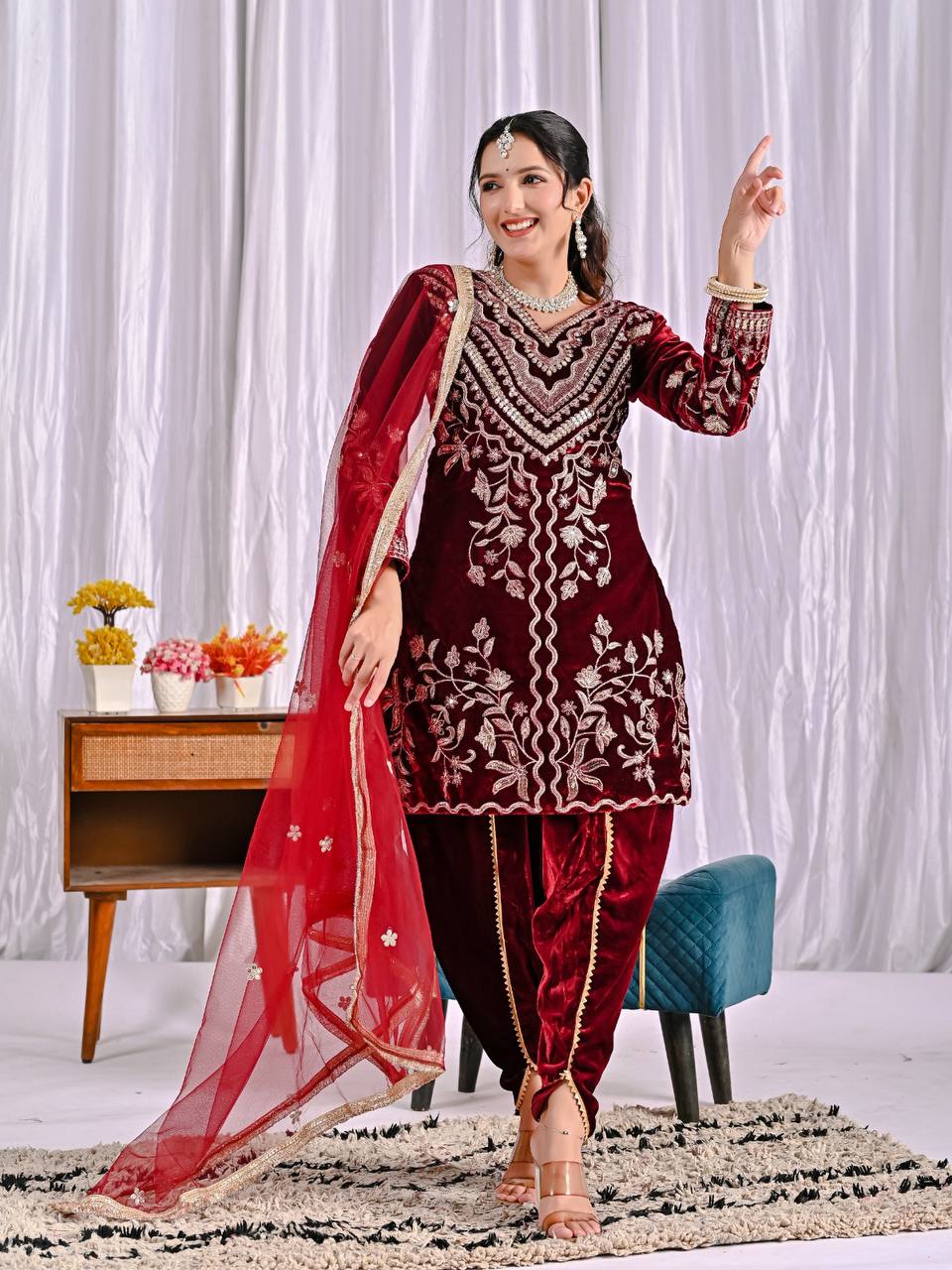 Alluring Maroon Velvet Embroidery Work Dhoti Suit