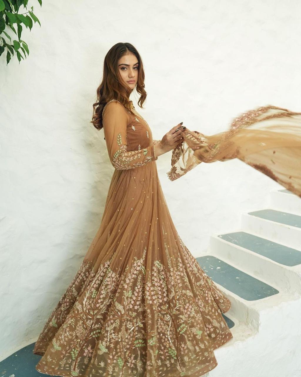 Presenting Beige Color Sequence Embroidered Gown