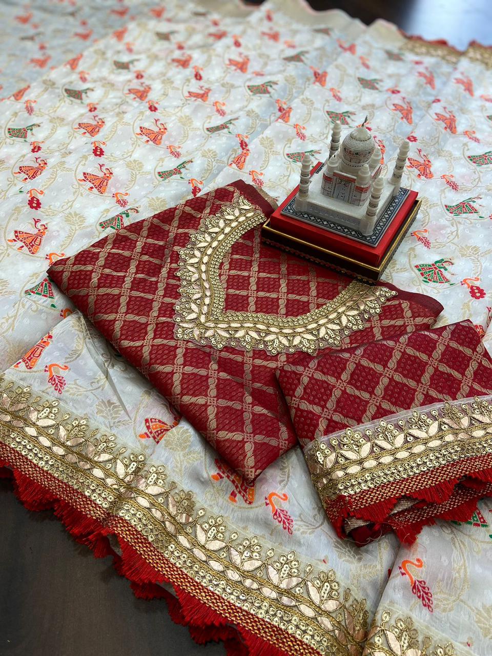 Classy Off White Saree With Red Bandhani Blouse