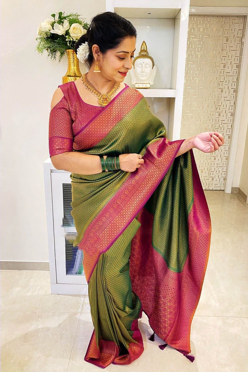 Mehendi Green Patola Silk Saree with Red woven Border - PreeSmA